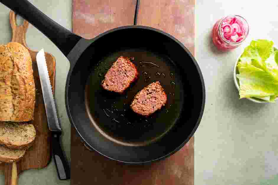 Meatloaf Sandwich Recipe: 
Slice four generous 1-inch thick cuts of meatloaf.