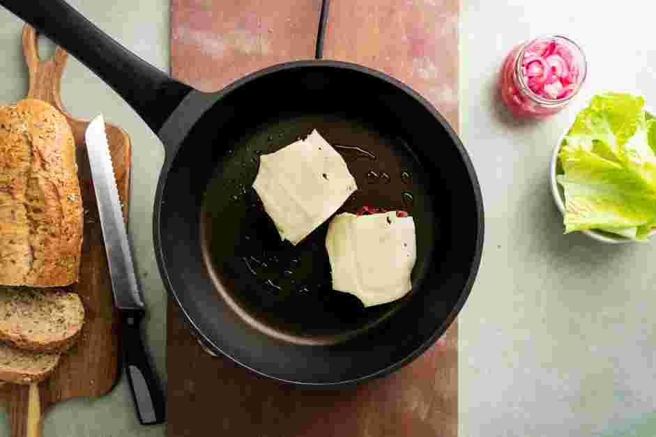 Meatloaf Sandwich Recipe: 
Top the meatloaf slices with cheese and melt.