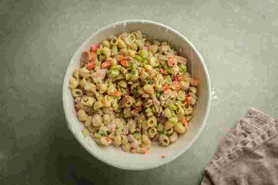 Tuna Pasta Salad Recipe: 
Cover the bowl with plastic wrap and refrigerate until cold, about 2 hours.