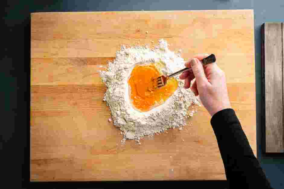 Lasagna Sheets Recipe:
Use a fork to whisk the eggs until the egg whites and yolks are well combined.