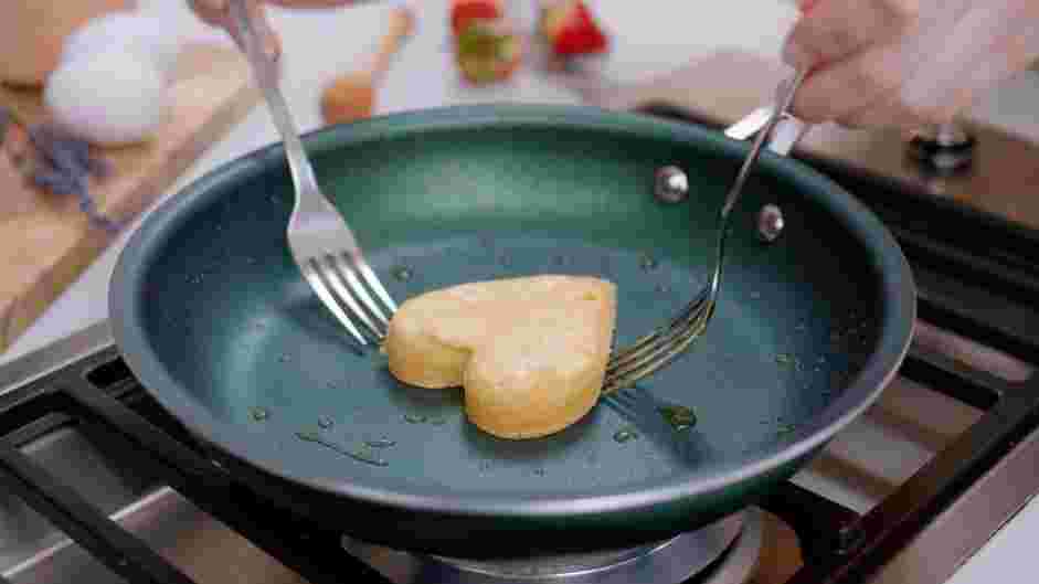 Heart Shaped Pancakes Recipe: Cook for about 2 minutes or until the bubbles on top are dry.