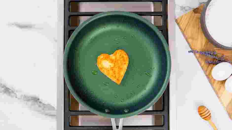 Heart Shaped Pancakes Recipe:
Flip the pancake and cook until the bottom of the pancake is golden brown, about 1-2 minutes.