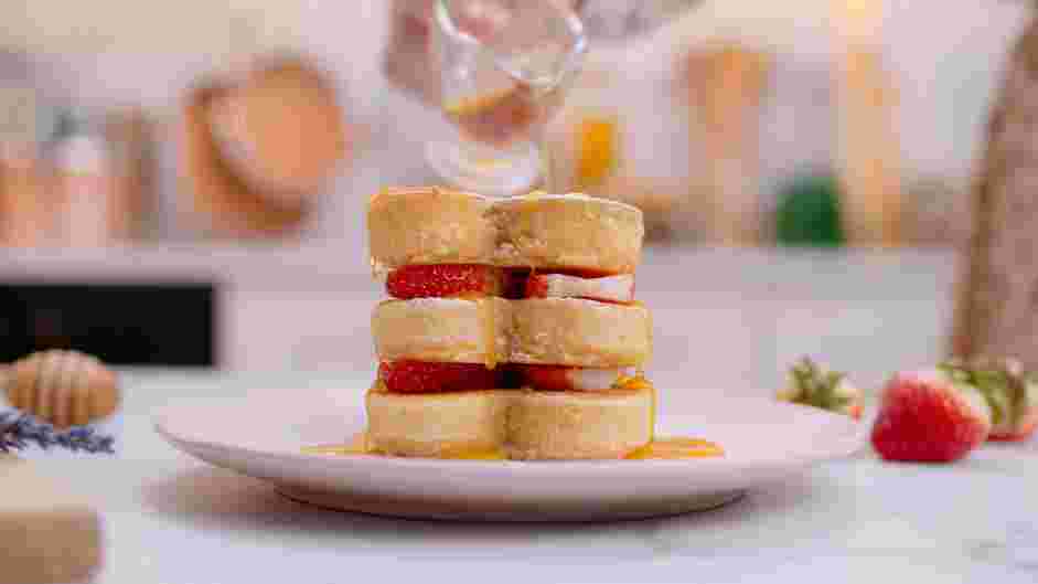 Heart Shaped Pancakes Recipe: Top with powdered sugar and drizzle with chocolate or maple syrup.