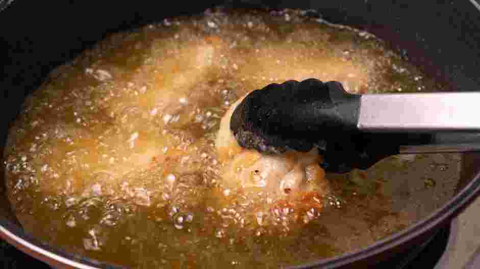 Buttermilk Chicken Sandwich Recipe:
Deep fry the chicken thighs for about 6-8 minutes until golden brown, crispy and cooked through.