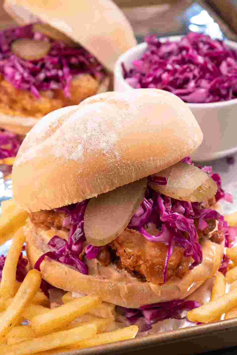 Buttermilk Chicken Sandwich Recipe: 
Layer the red cabbage slaw.