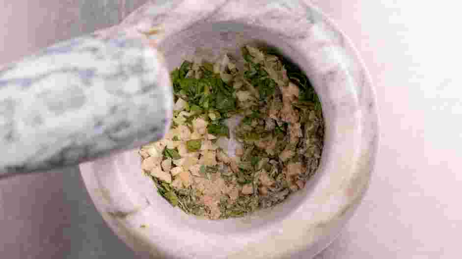 Pork Spring Roll (Por Pia Tod) Recipe: 
Using a mortar and pestle, crush 1 tablespoon of cilantro, garlic and white pepper powder together.