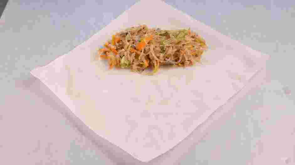 Pork Spring Roll (Por Pia Tod) Recipe:
Place one spring roll wrapper flat at an angle, in a diamond shape.