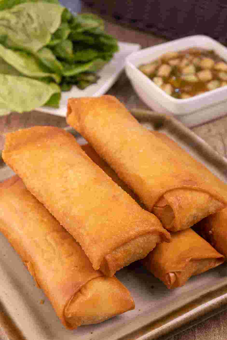 Pork Spring Roll (Por Pia Tod) Recipe: Serve spring rolls on a platter with the dipping sauce.