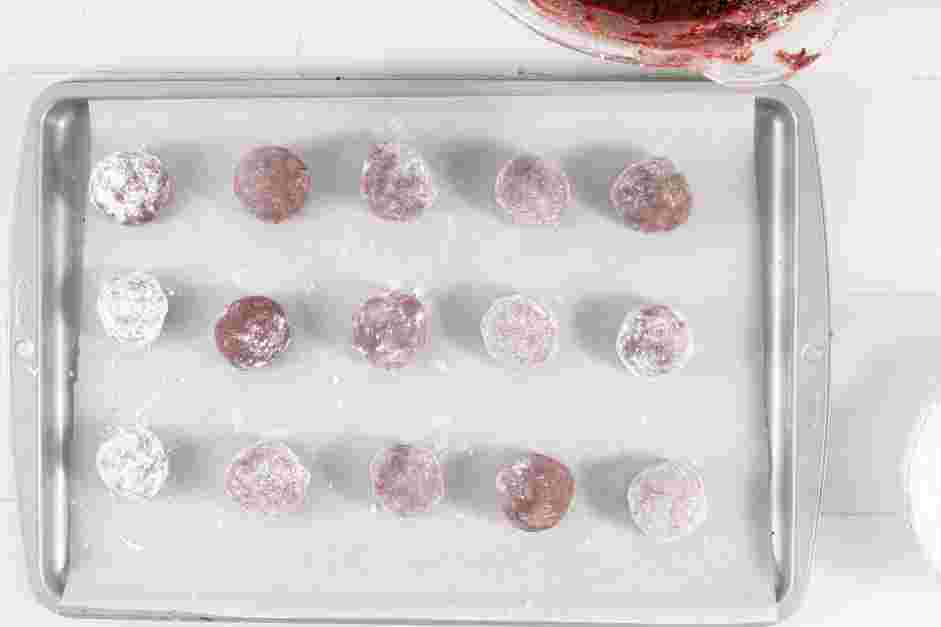 Red Velvet Crinkle Cookies Recipe:
Re-roll all of the cookie dough in the powdered sugar and bake the cookies for 10-12 minutes, or until the cookies are puffy and have a crackled appearance.