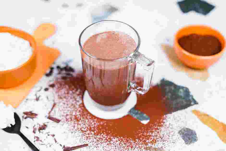 Vegan Hot Chocolate Recipe:
Transfer the hot chocolate to a mug and stir in maple syrup.