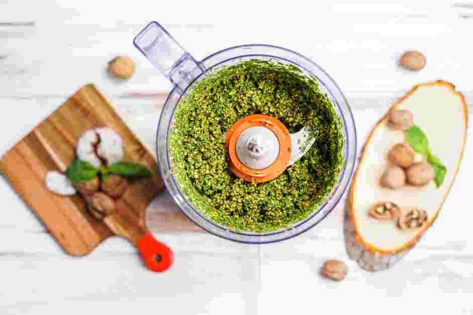 Walnut Pesto Recipe:
In the bowl of a food processor, place the toasted walnuts, garlic, basil, salt and pepper.