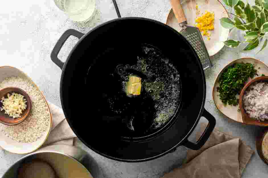 Parmesan Risotto Recipe:
In a small pot, bring the chicken stock to a simmer.