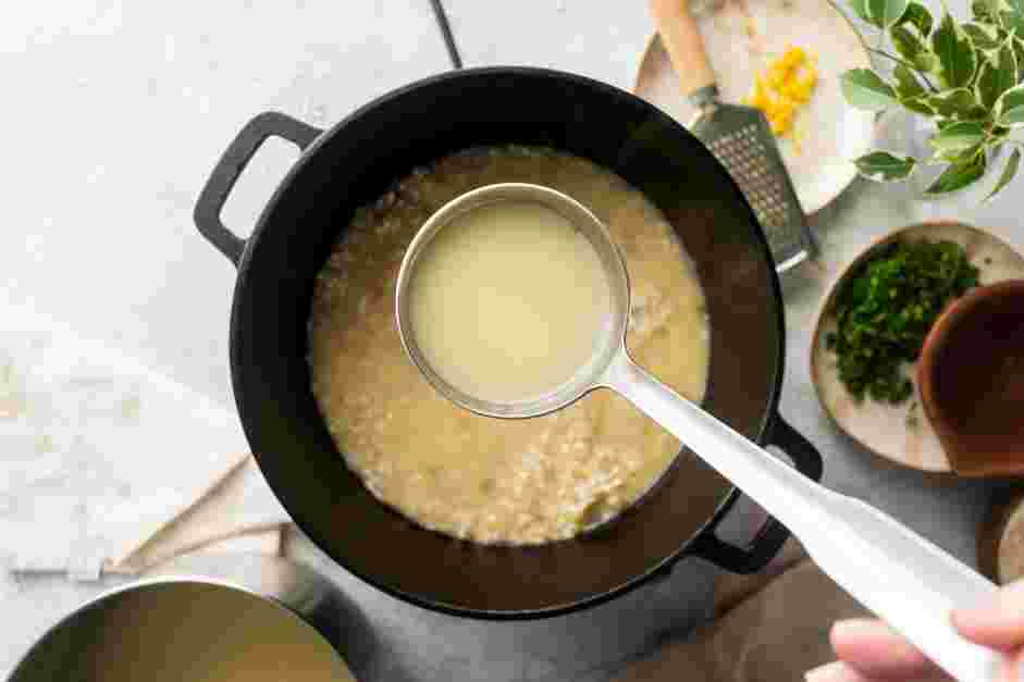 Parmesan Risotto Recipe: 
Add one ladle full of the chicken broth and cook, gently stirring constantly, until the rice has absorbed the liquid.