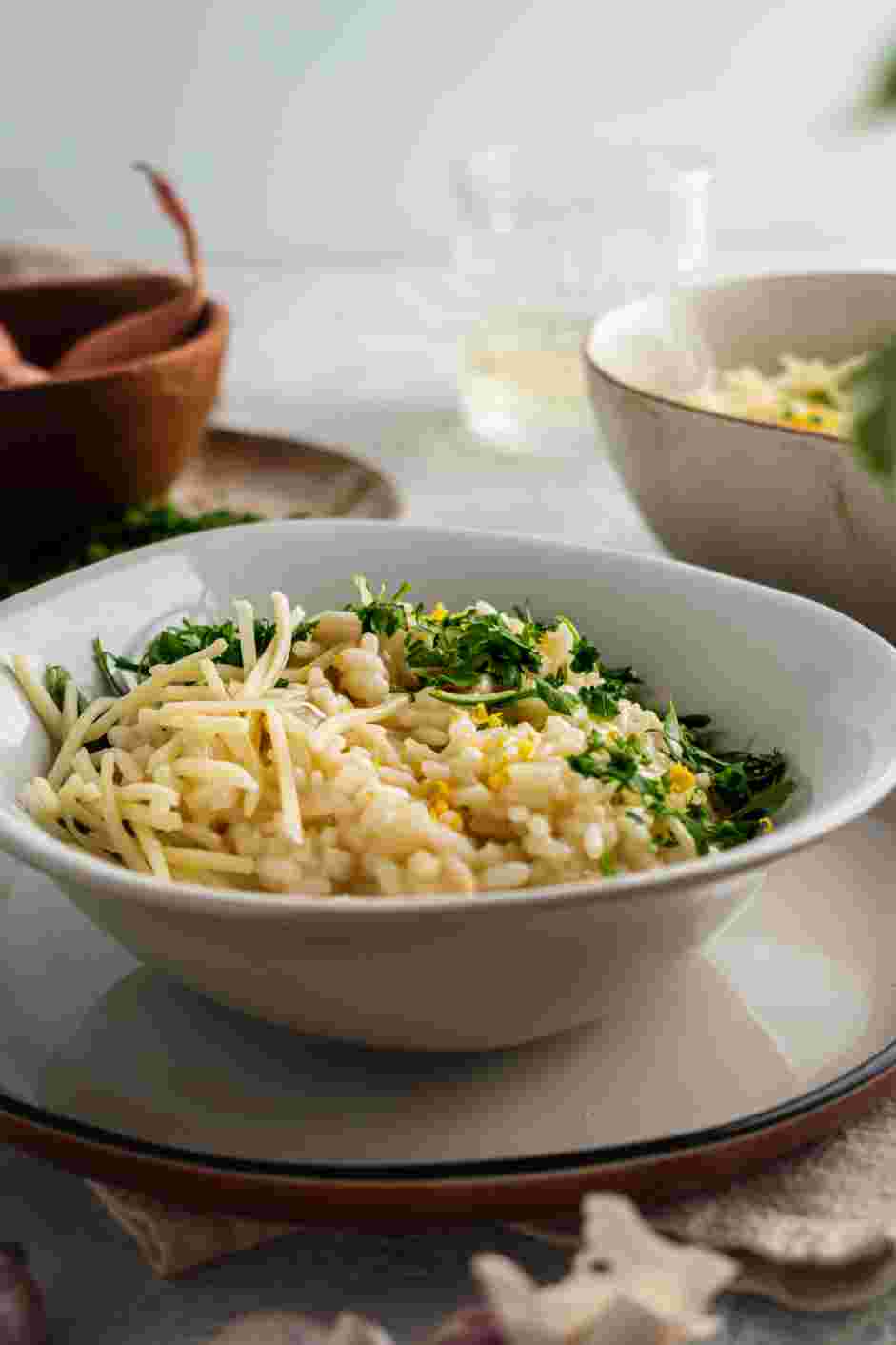 Parmesan Risotto Recipe: Garnish with more Parmesan cheese and chopped parsley before serving.