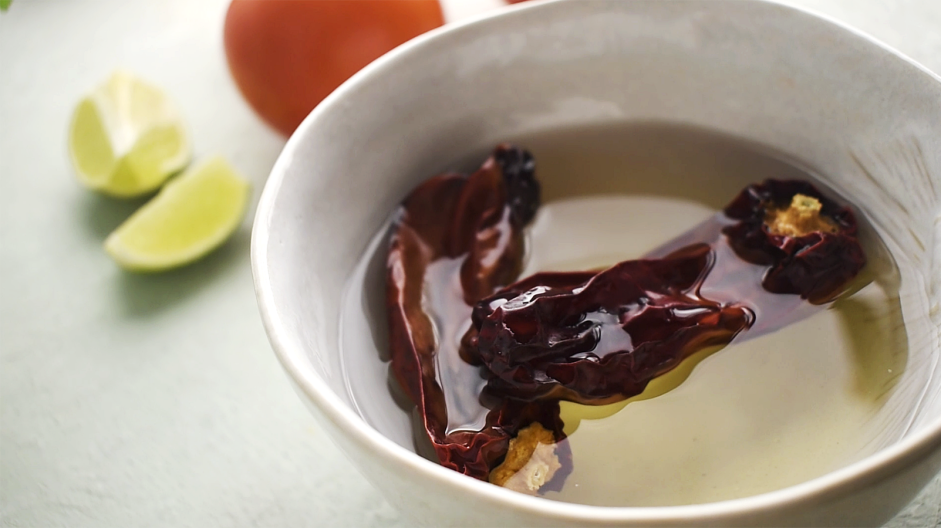 Salsa Roja Recipe: 
While the vegetables are roasting, rehydrate your guajillo peppers.