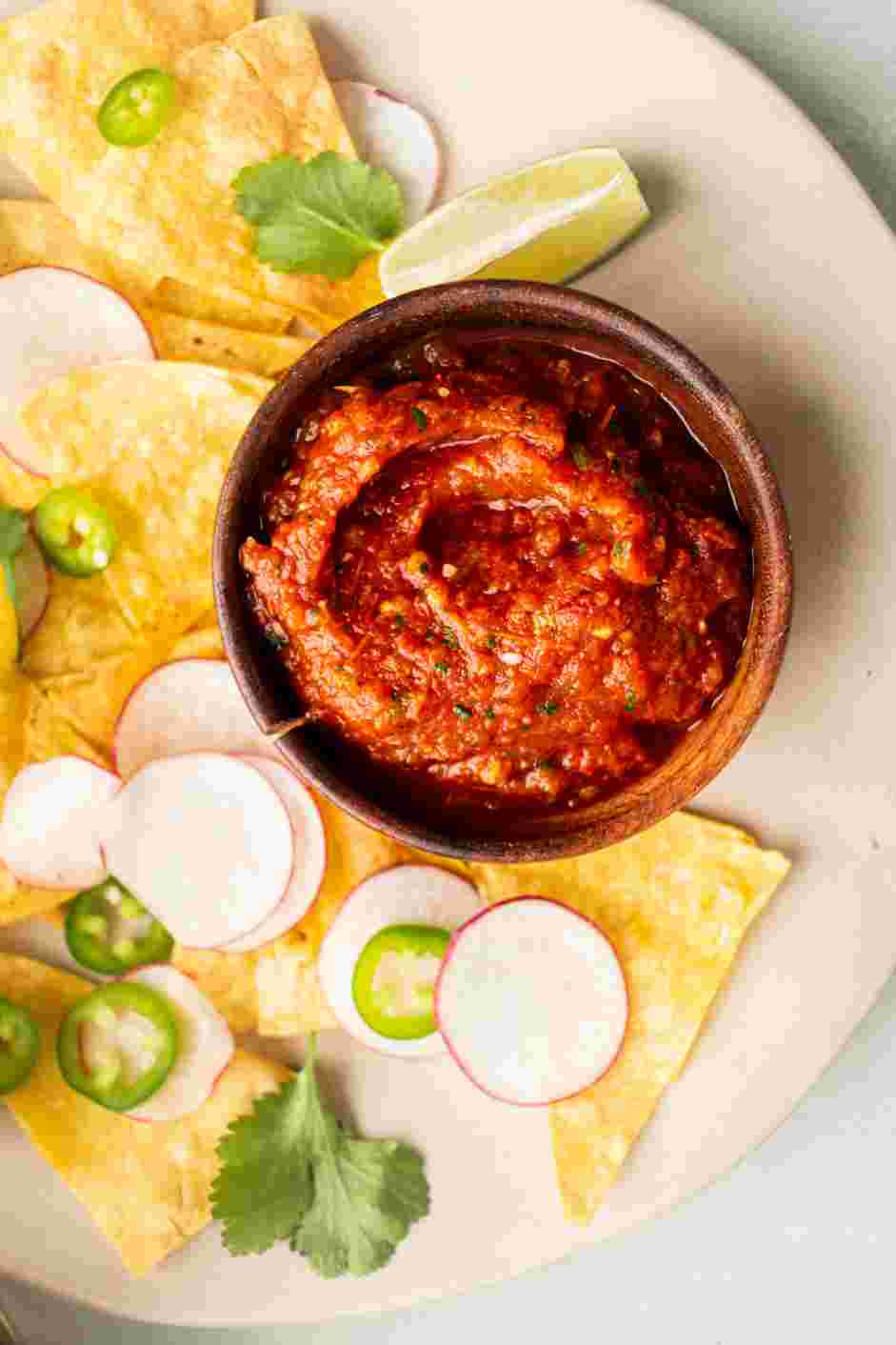 Salsa Roja Recipe: Serve the salsa roja with tortilla chips.