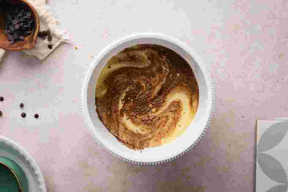 Chocolate Flan Recipe:
Once the temperature of the chocolate ganache has dropped to 100°F, slowly fold into the chocolate mixture on low speed until fully combined.
