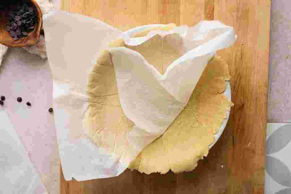 Chocolate Flan Recipe:
Transfer the shortcrust pastry sheet into the baking tin.