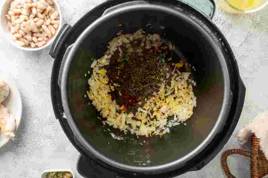 Instant Pot White Chicken Chili Recipe:
Add the garlic and cook until fragrant, about 1 minute.