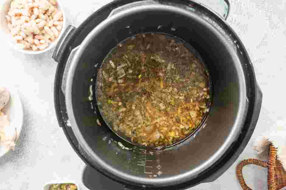 Instant Pot White Chicken Chili Recipe: 
Add the chicken broth and scrape up any browned bits on the bottom of the pot.