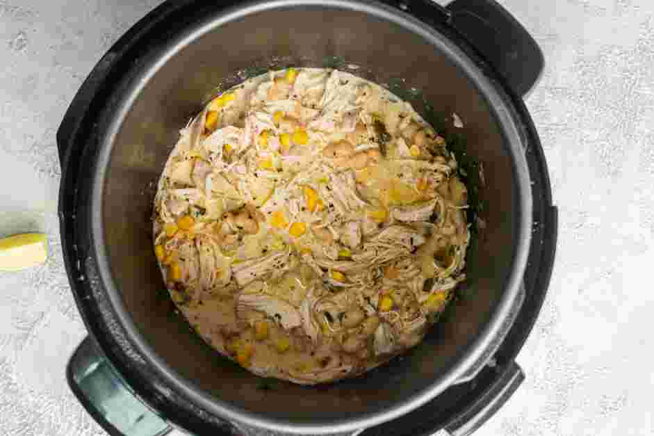 Instant Pot White Chicken Chili Recipe:
Stir in the shredded chicken breasts and lime juice.