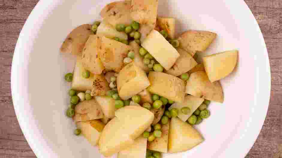 Cauliflower Potato Salad Recipe: 
Drain the potato and peas and place them in a mixing bowl.