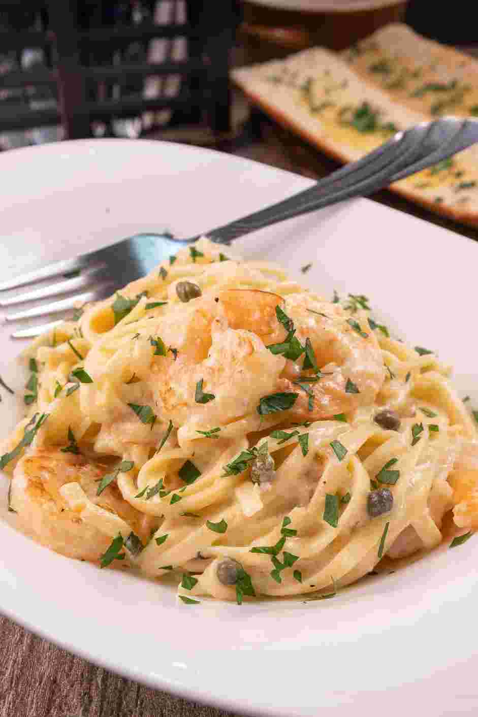 Creamy Shrimp Pasta Recipe: Garnish with chopped parsley and serve.