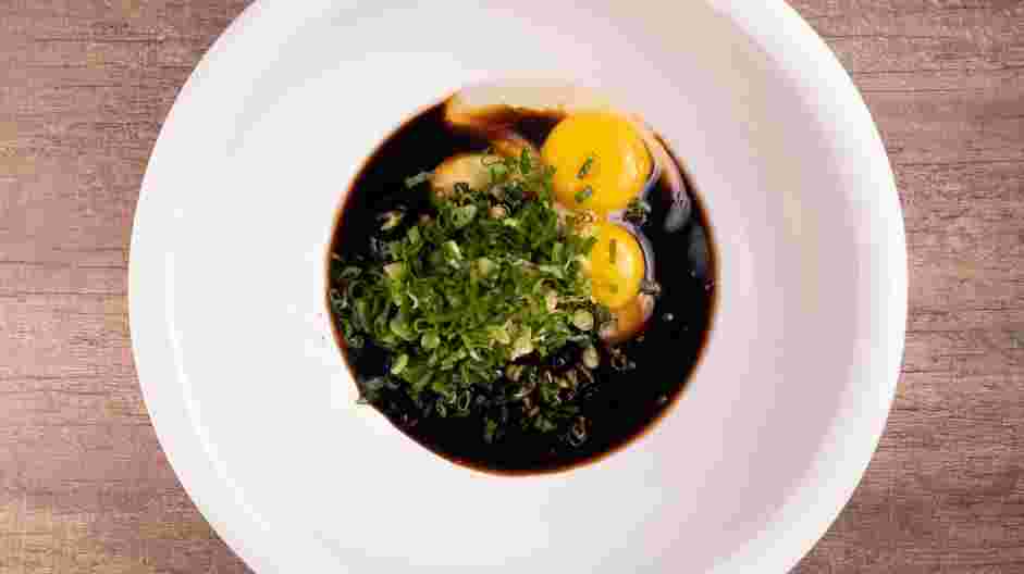 Mochiko Chicken Recipe:
In a large bowl, whisk together the sugar, soy sauce, gochujang, garlic, ginger, scallions and eggs until well combined.