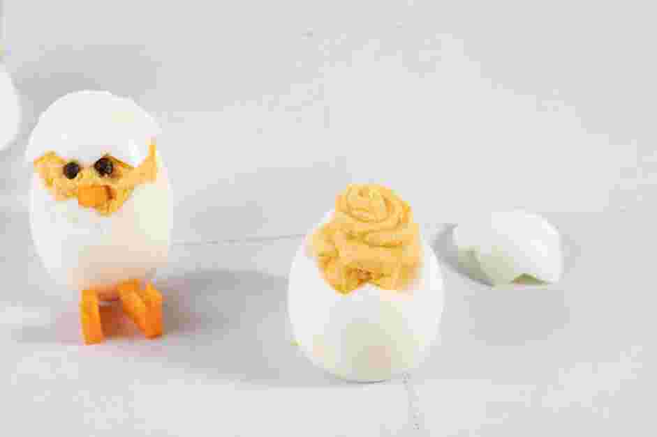 Deviled Egg Chicks Recipe: 
Assemble the deviled egg chicks.