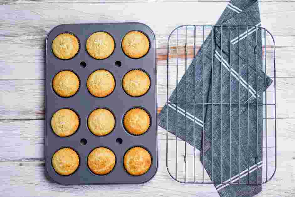 Yellow Cupcake Recipe: Bake the cupcakes, rotating the pan halfway, for 12-15 minutes, or until a toothpick inserted in the center comes out clean.