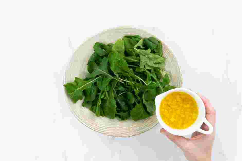 Citrus Salad Recipe:
On a large salad plate, add the arugula and about two tablespoons of the dressing.