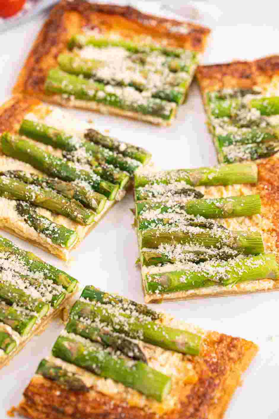 Asparagus Tart Recipe: 
Sprinkle the top of the asparagus tart with Parmesan cheese.