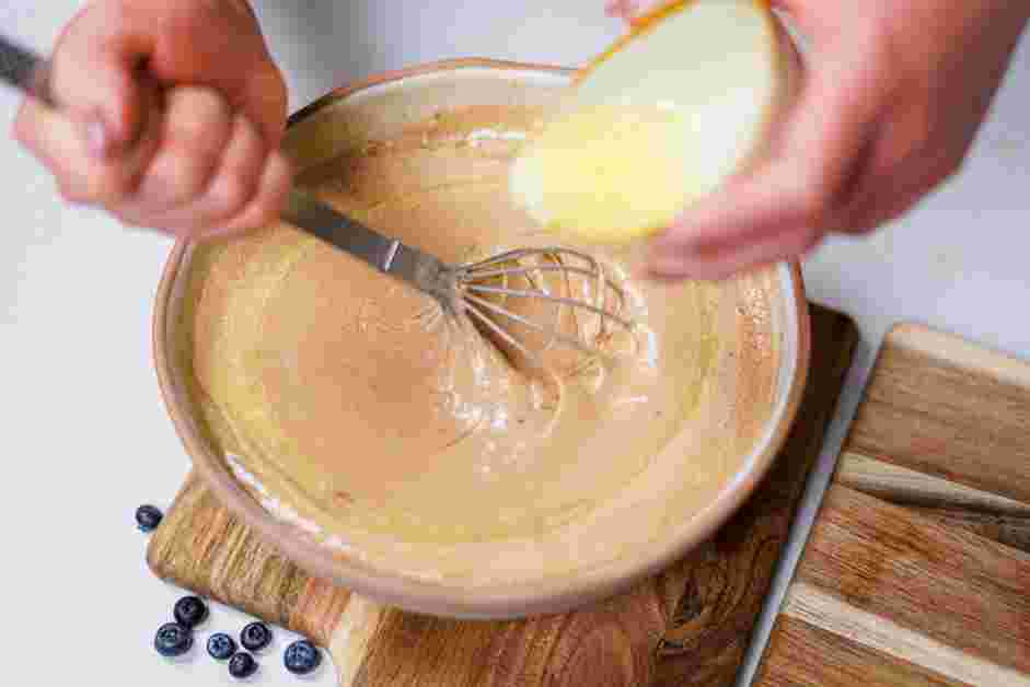 Blueberry Crepes Recipe:
Slowly whisk the melted butter into the mixture until smooth.