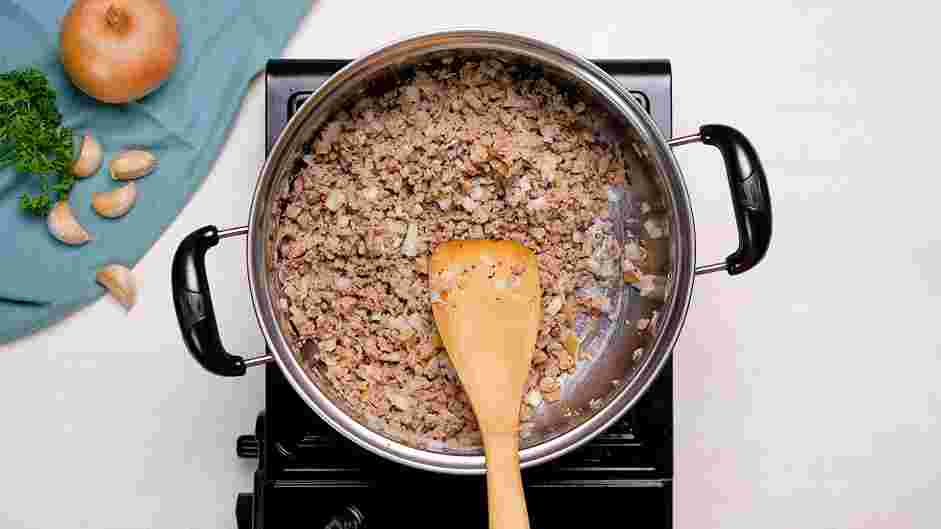 Rigatoni Bolognese Recipe:
Lower the heat to medium and add the chopped onions and cook stirring occasionally until softened, about 3-4 minutes.