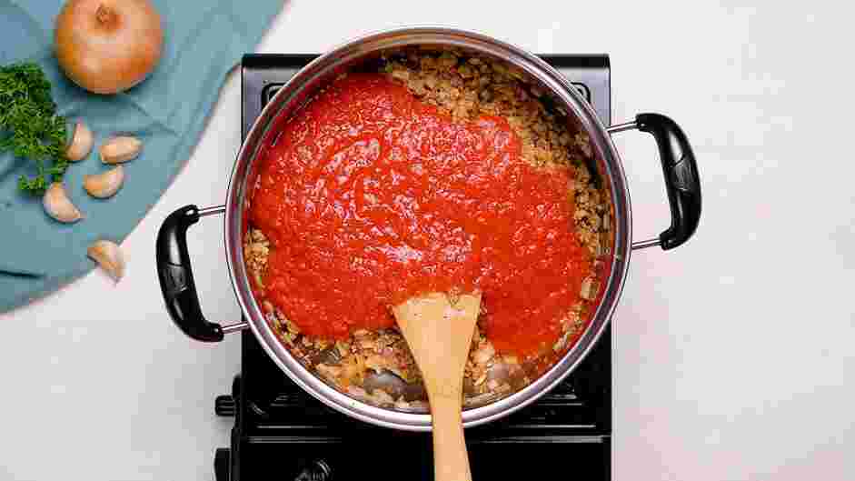 Rigatoni Bolognese Recipe: 
Stir in the crushed tomatoes and mix until well combined.