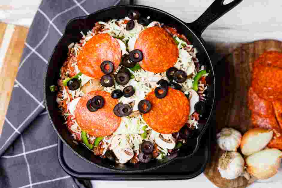 Crustless Pizza Recipe:
Top with the remaining mozzarella cheese, pepperoni slices and black olives, if using.