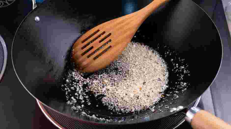 Bok Choy Stir Fry Recipe: In a large skillet or a wok over medium-high heat, heat the avocado or grapeseed oil.