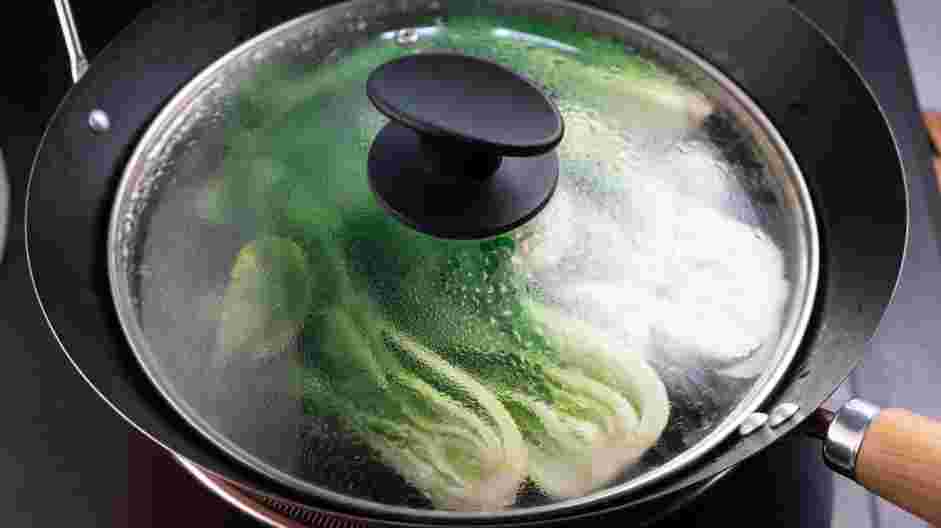 Bok Choy Stir Fry Recipe:
Add the vegetable stock to the skillet and cover with a lid.