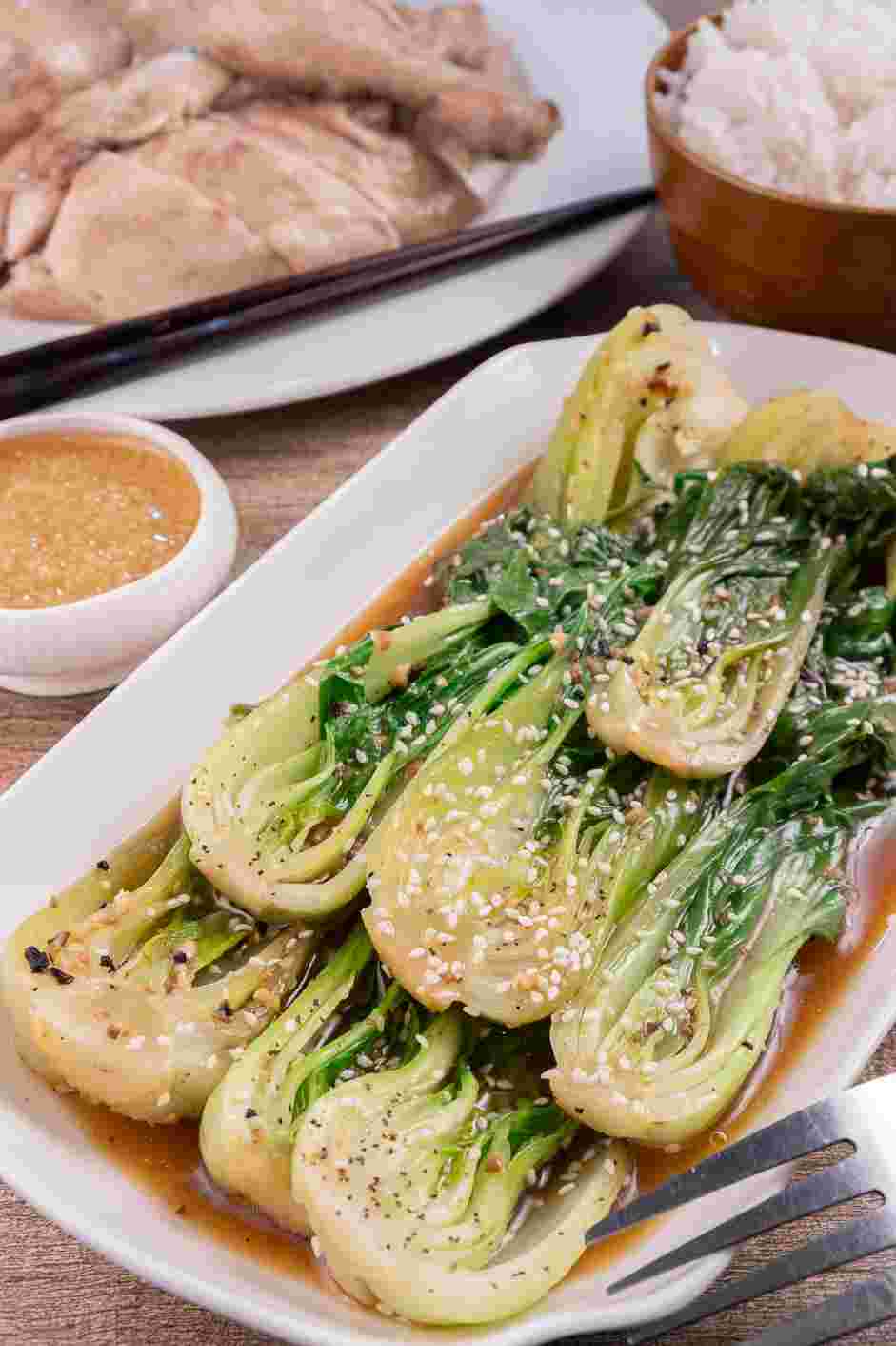 Bok Choy Stir Fry Recipe: Transfer the bok choy to a serving platter and drizzle with toasted sesame oil and sesame seeds.