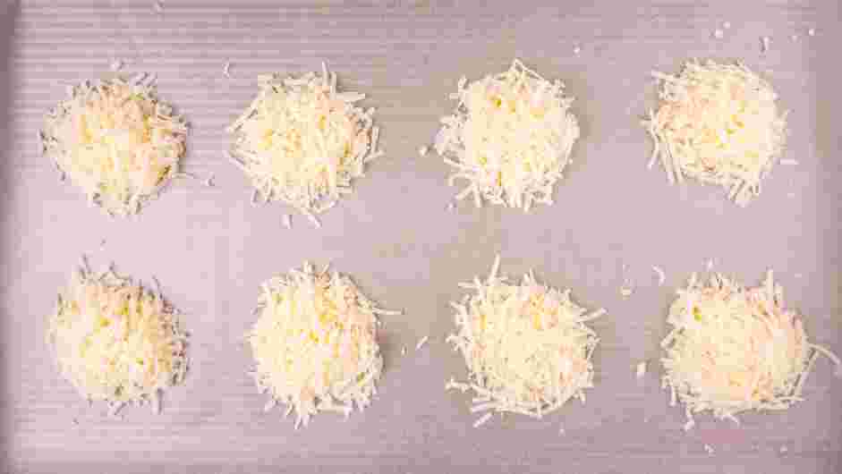 Parmesan Cheese Crisps Recipe: 
Preheat the oven to 400&deg;F.