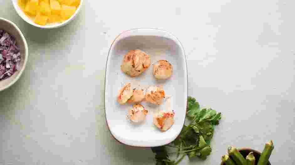 Broiled Scallops Recipe: 
In a bowl, coat the scallops with a light dusting of butter or oil.