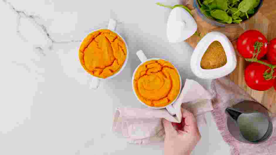 Carrot Souffle Recipe: 
Transfer the ramekins to a baking sheet and bake until slightly puffed and cooked through, about 20-25 minutes.