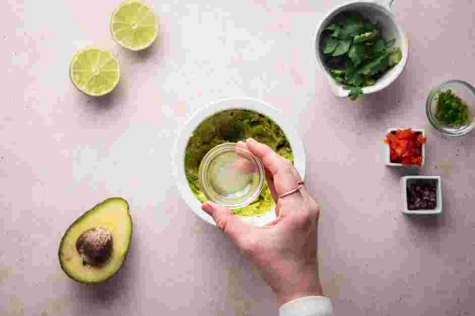 Keto Guacamole Recipe: Mix in the lime juice.