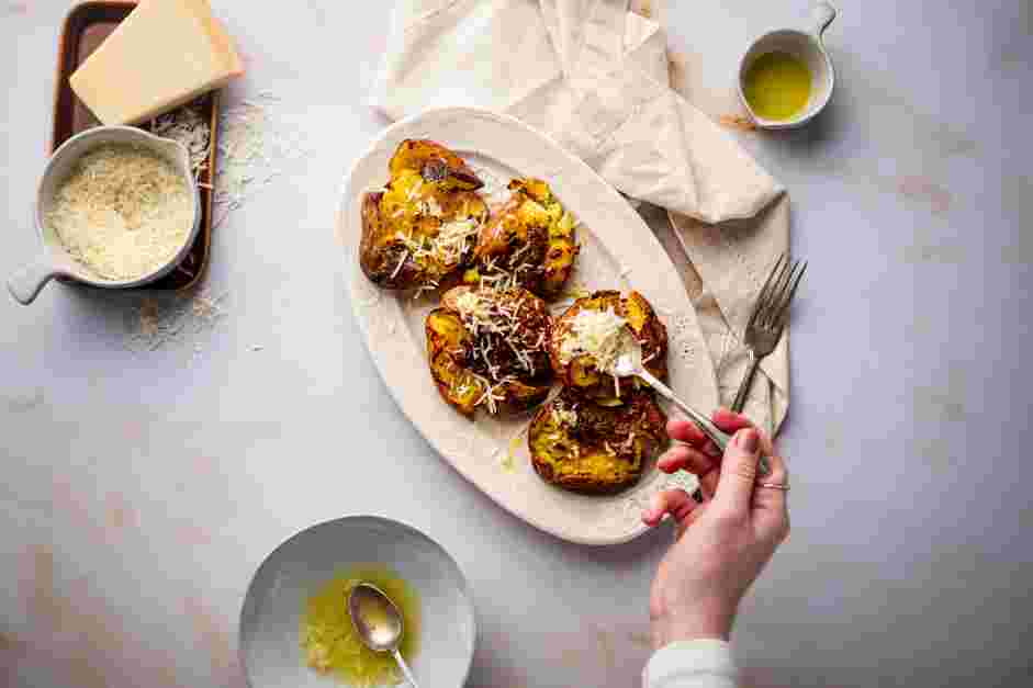 Smashed Red Potatoes Recipe:
Once the potatoes are out of the oven, brush each potato with the garlic butter and sprinkle on the Parmesan cheese.