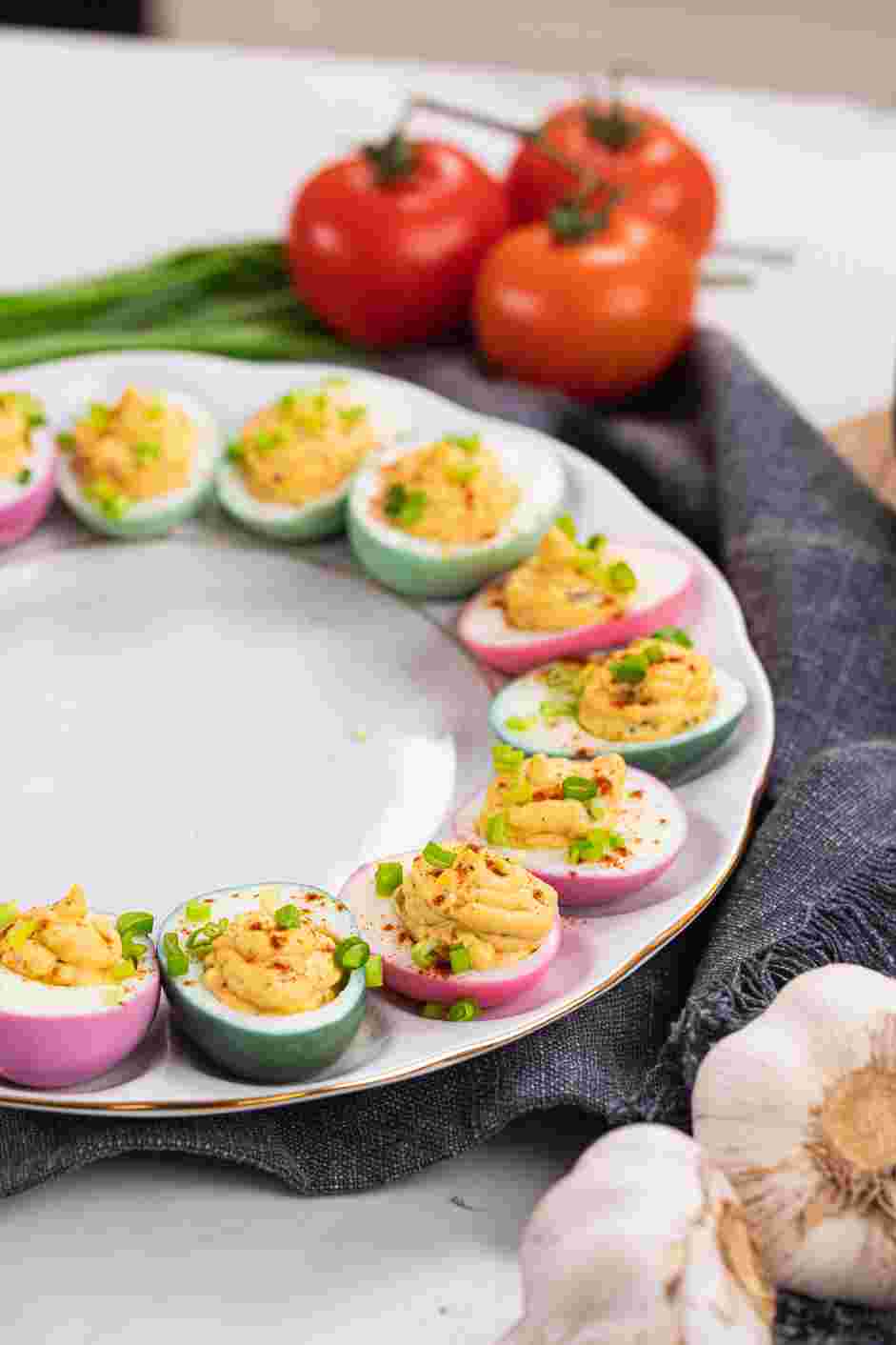 Easter Deviled Eggs Recipe: Top the Easter deviled eggs with a sprinkling of smoked paprika and chives.