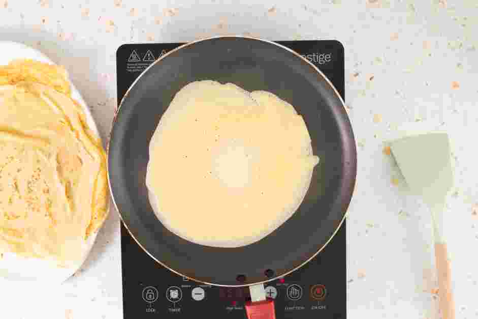 Swedish Pancakes Recipe: 
Grease a large nonstick skillet with butter and pour ⅓ cup of batter into the skillet.