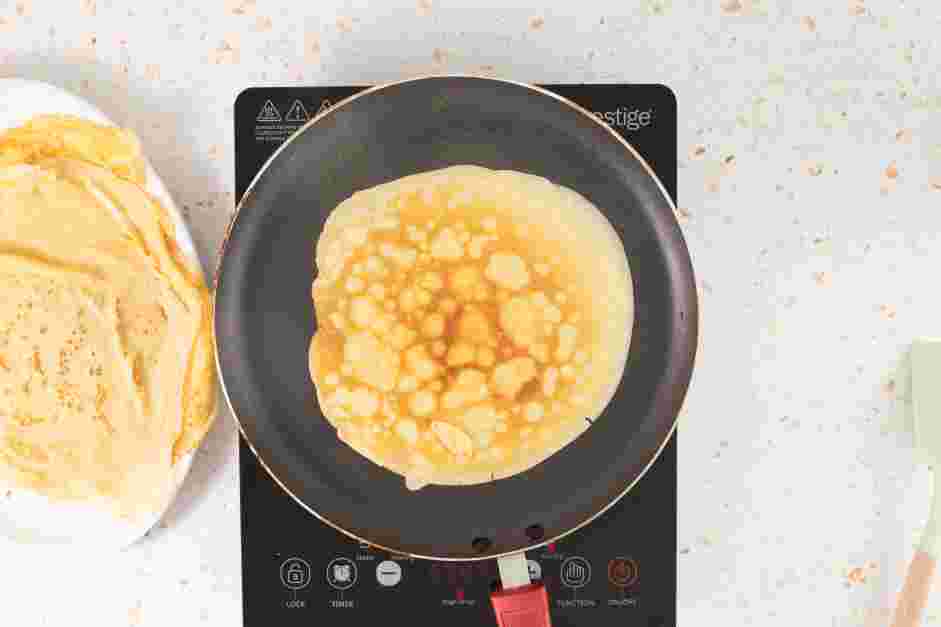 Swedish Pancakes Recipe:
Flip the pancakes over with a spatula and cook until the bottom is lightly browned, about 30 seconds.