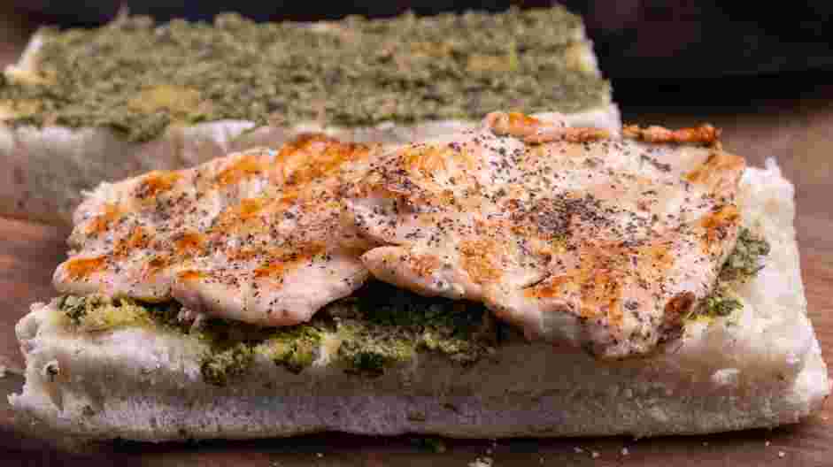 Chicken Pesto Sandwich Recipe: 
Place the grilled chicken on the bottom slice of the bread.