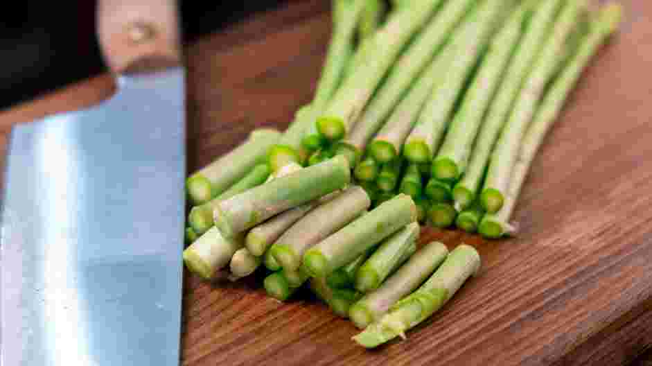 Air Fryer Asparagus Recipe: Trim the tough ends, about 1-2 inches.