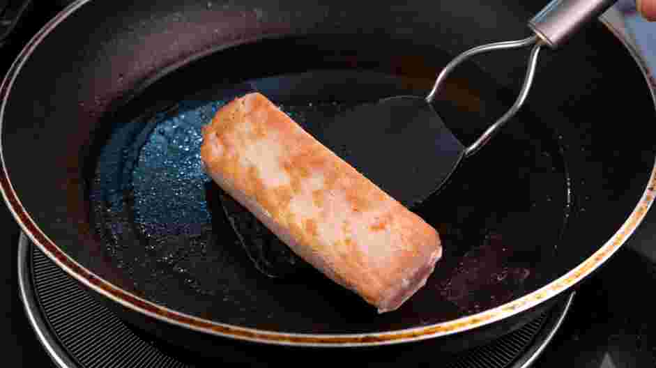 Tuna Tataki Recipe:
On a nonstick skillet over high heat, heat the oil until wisps of smoke appear.